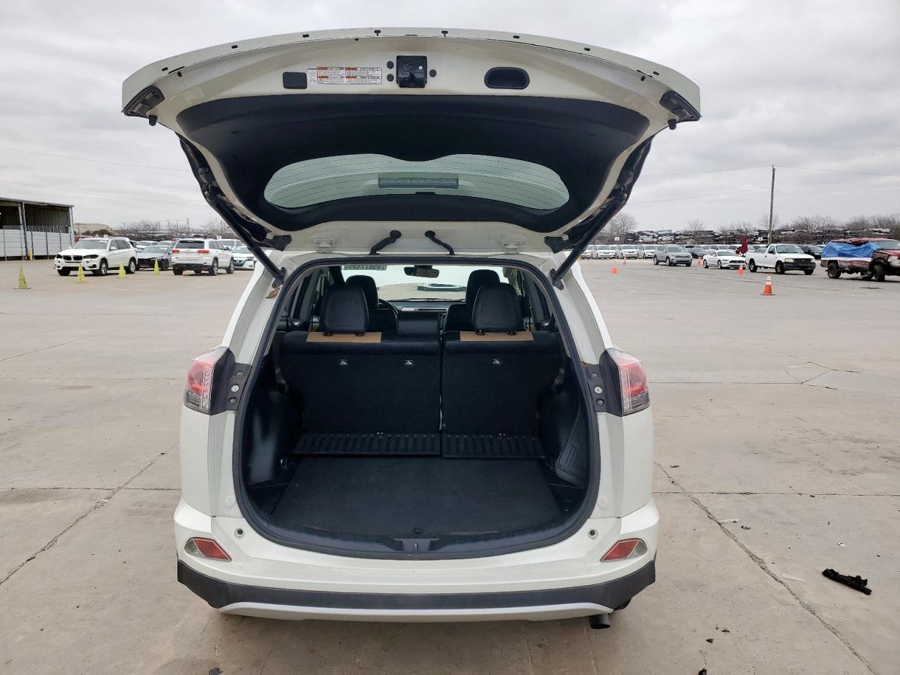 2018 Toyota RAV 4 VIN JTMYFREVXJD127729 Copart auction photo, front end / side damage thumbnail 6