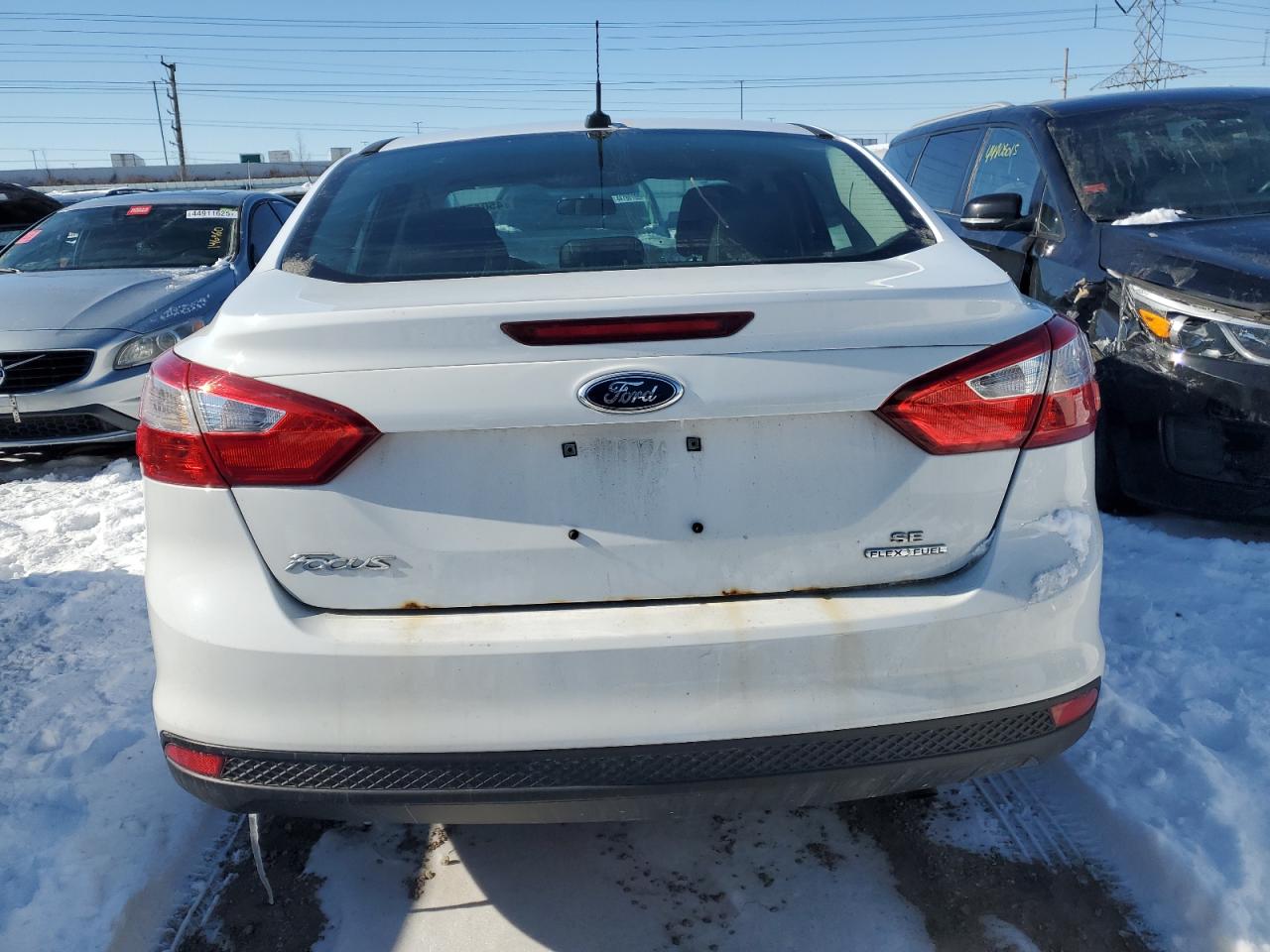 2014 Ford Focus VIN 1FADP3F26EL369447 Copart auction photo, side / normal wear damage thumbnail 6