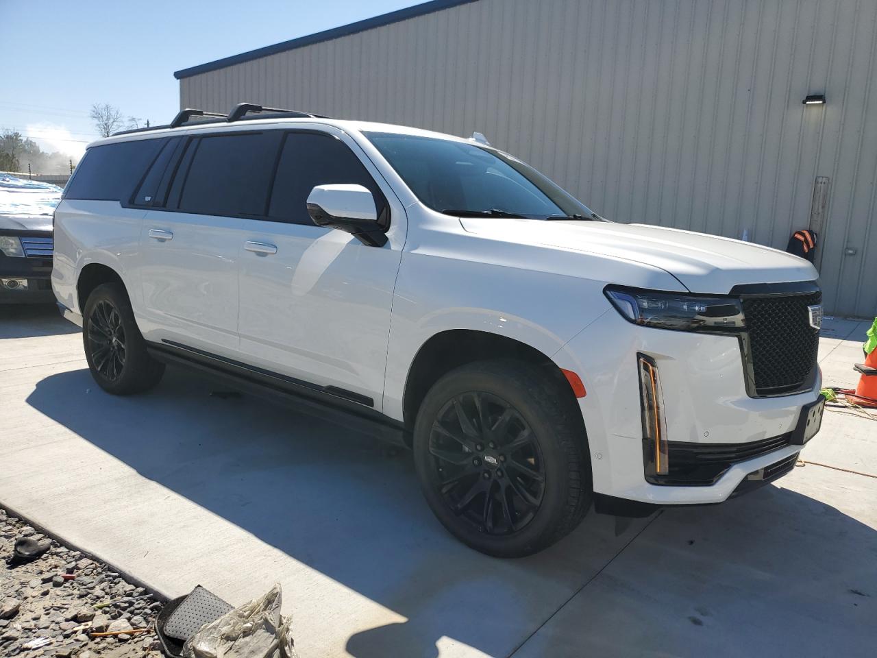 2022 Cadillac Escalade VIN 1GYS4RKL1NR337220 Copart auction photo, vandalism damage thumbnail 4