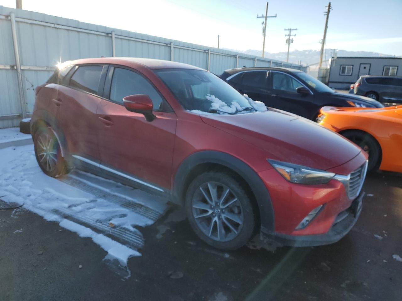2016 Mazda CX-3 VIN JM1DKBD78G0113185 Copart auction photo, minor dent/scratches damage thumbnail 4