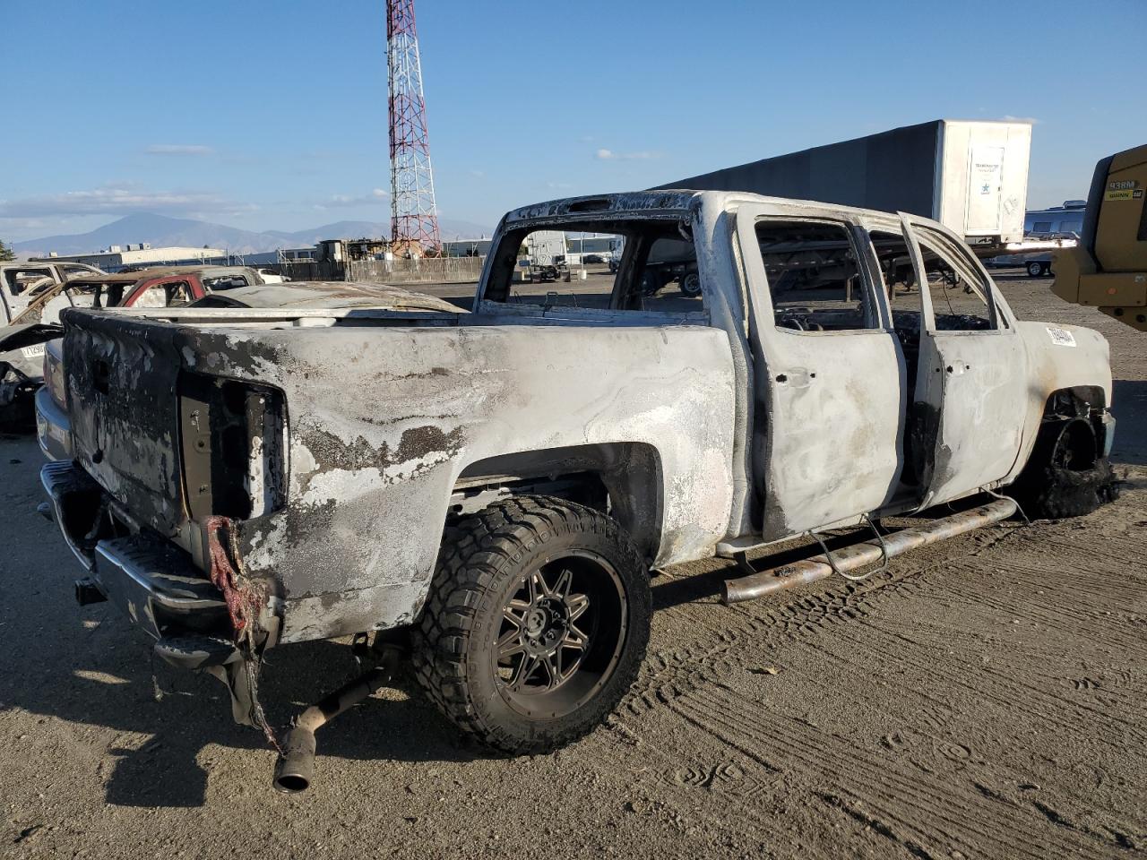 2015 Chevrolet Silverado VIN 3GCPCREC2FG396174 Copart auction photo, burn damage thumbnail 3