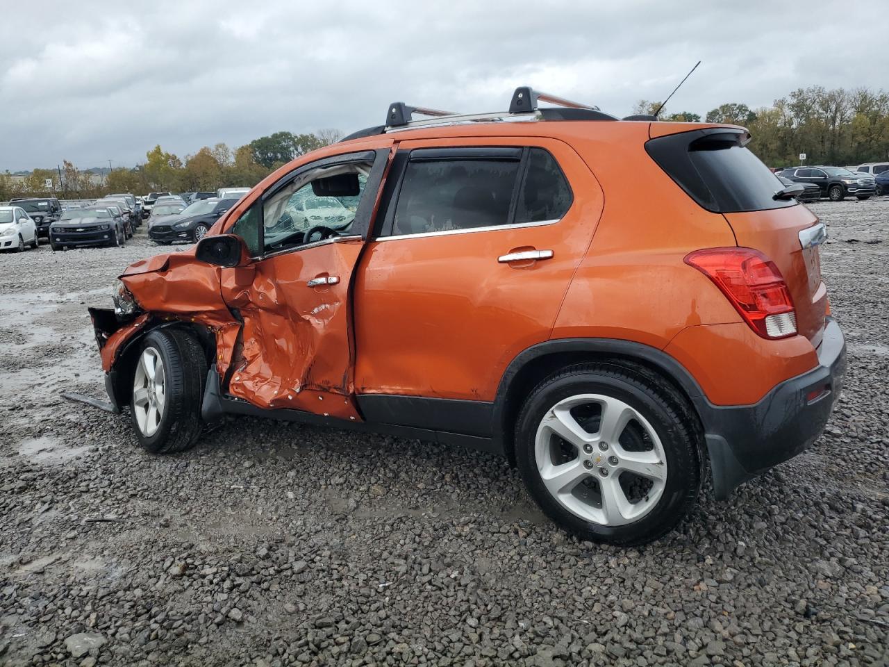 2015 Chevrolet Trax VIN KL7CJNSB1FB227407 Copart auction photo, side / front end damage thumbnail 2