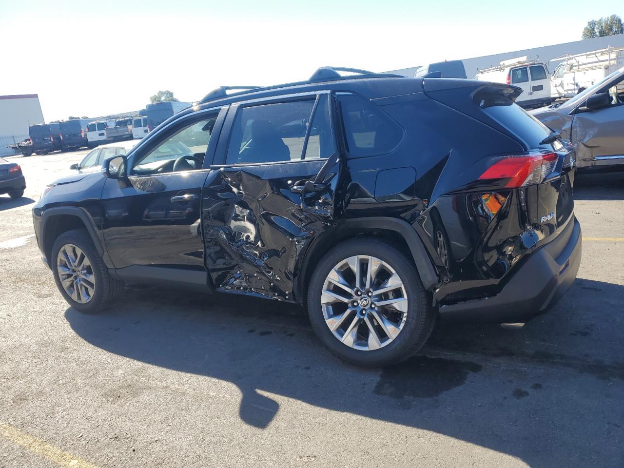 2023 Toyota RAV 4 VIN 2T3A1RFV9PW380700 Copart auction photo, side / rear end damage thumbnail 2