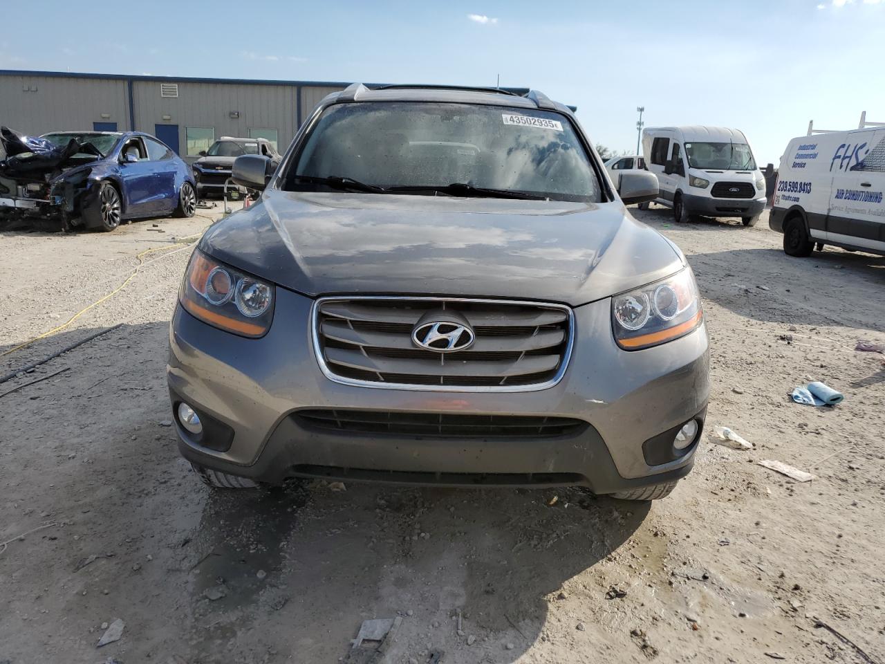 2011 Hyundai Santa Fe VIN 5XYZK3AB1BG063785 Copart auction photo, rear end damage thumbnail 5