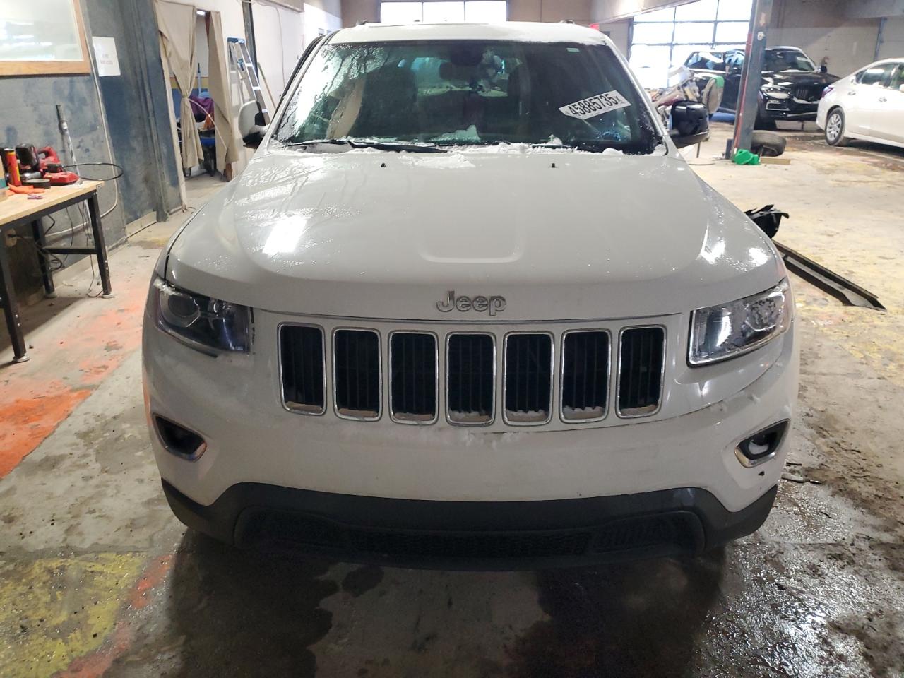 2014 Jeep Grand Cherokee VIN 1C4RJEAG2EC473224 Copart auction photo, side / undercarriage damage thumbnail 5
