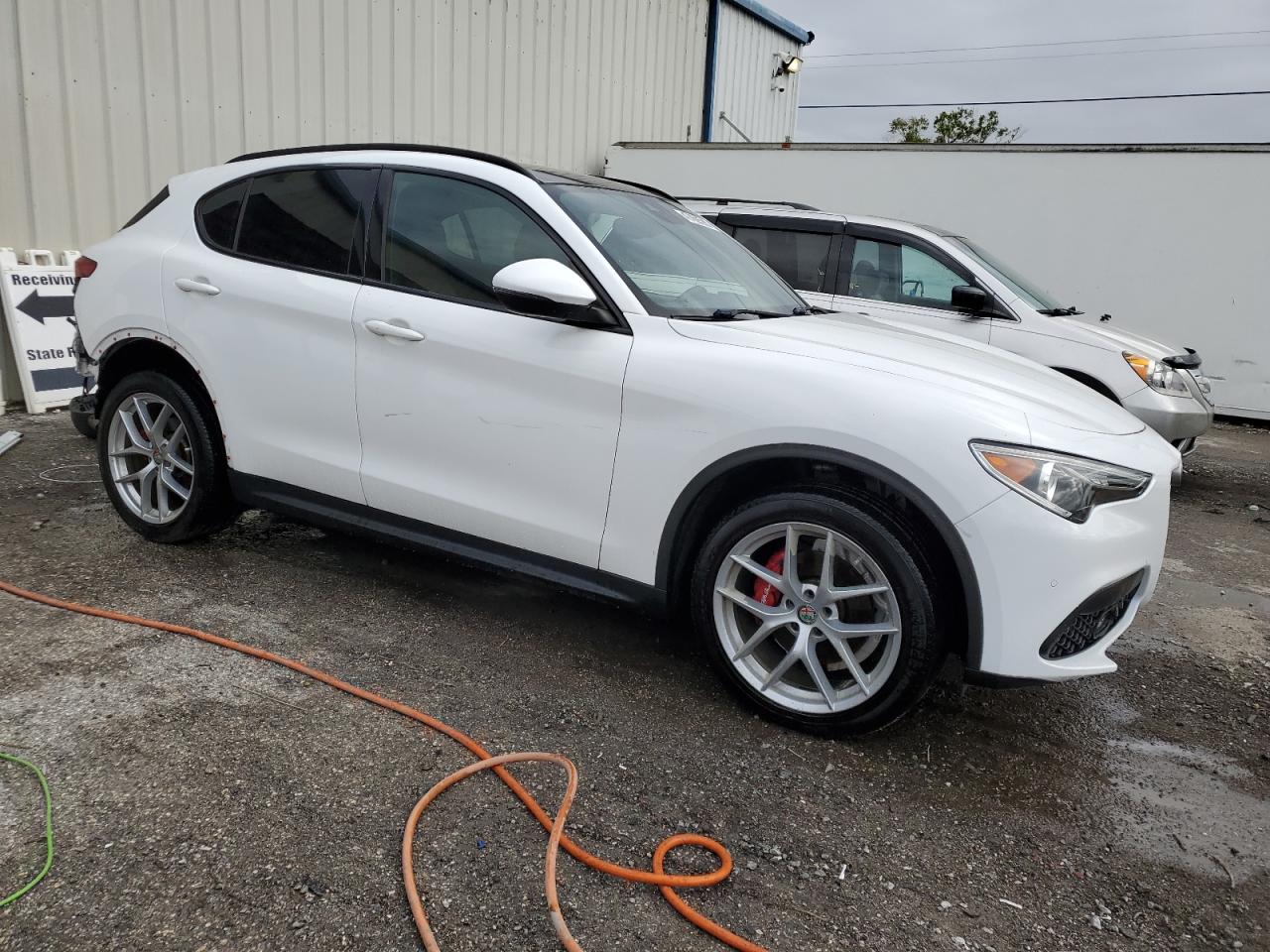 2019 Alfa Romeo Stelvio VIN ZASPAKBN2K7C58702 Copart auction photo, rear end damage thumbnail 4