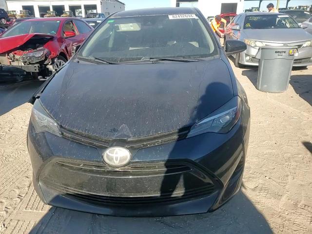 2018 Toyota Corolla VIN 5YFBURHE3JP771559 Copart auction photo, side / front end damage thumbnail 11
