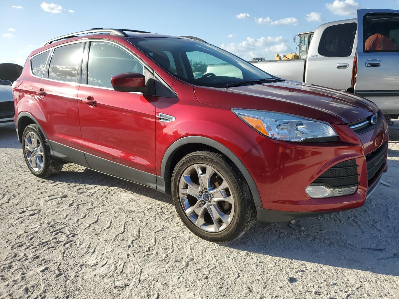 2014 Ford Escape VIN 1FMCU0GX4EUA74411 Copart auction photo, water/flood damage thumbnail 4