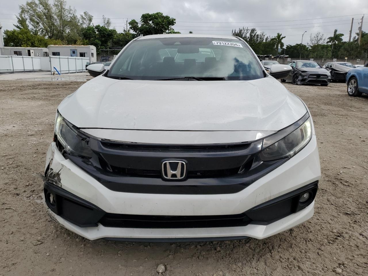 2020 Honda Civic VIN 2HGFC2F84LH556386 Copart auction photo, front end / side damage thumbnail 5