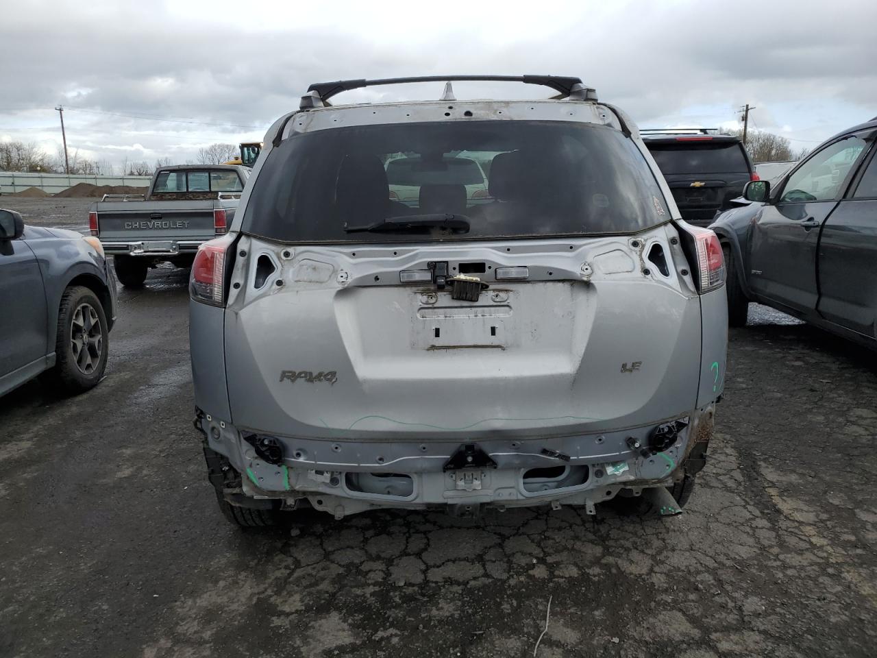 2018 Toyota RAV 4 VIN 2T3ZFREV6JW462705 Copart auction photo, rear end damage thumbnail 6