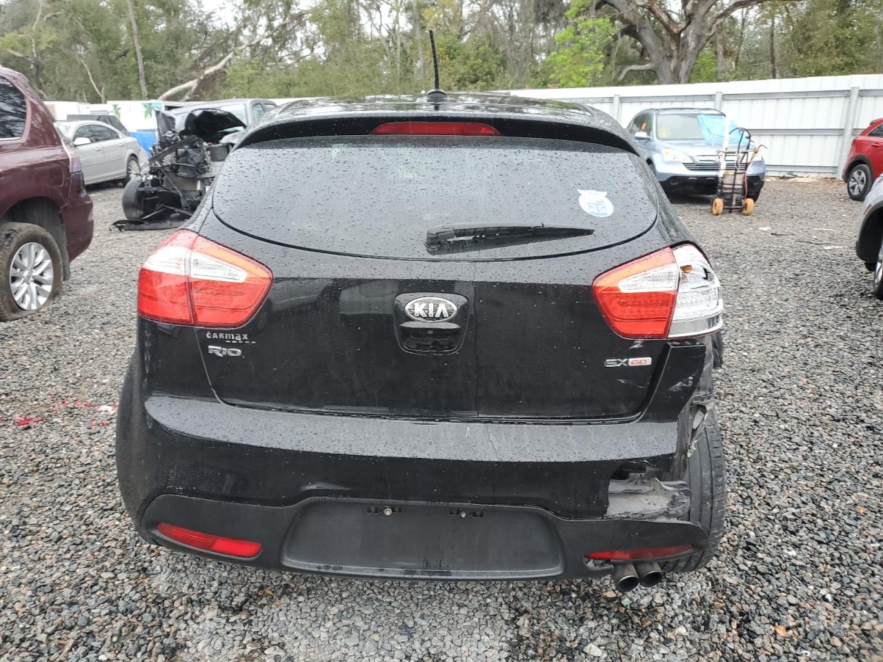 2013 KIA Rio VIN KNADN5A36D6174583 Copart auction photo, side damage thumbnail 6