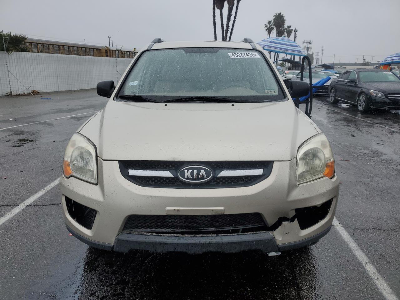 2009 KIA Sportage VIN KNDJE723097599363 Copart auction photo, front end / minor dent/scratches damage thumbnail 5