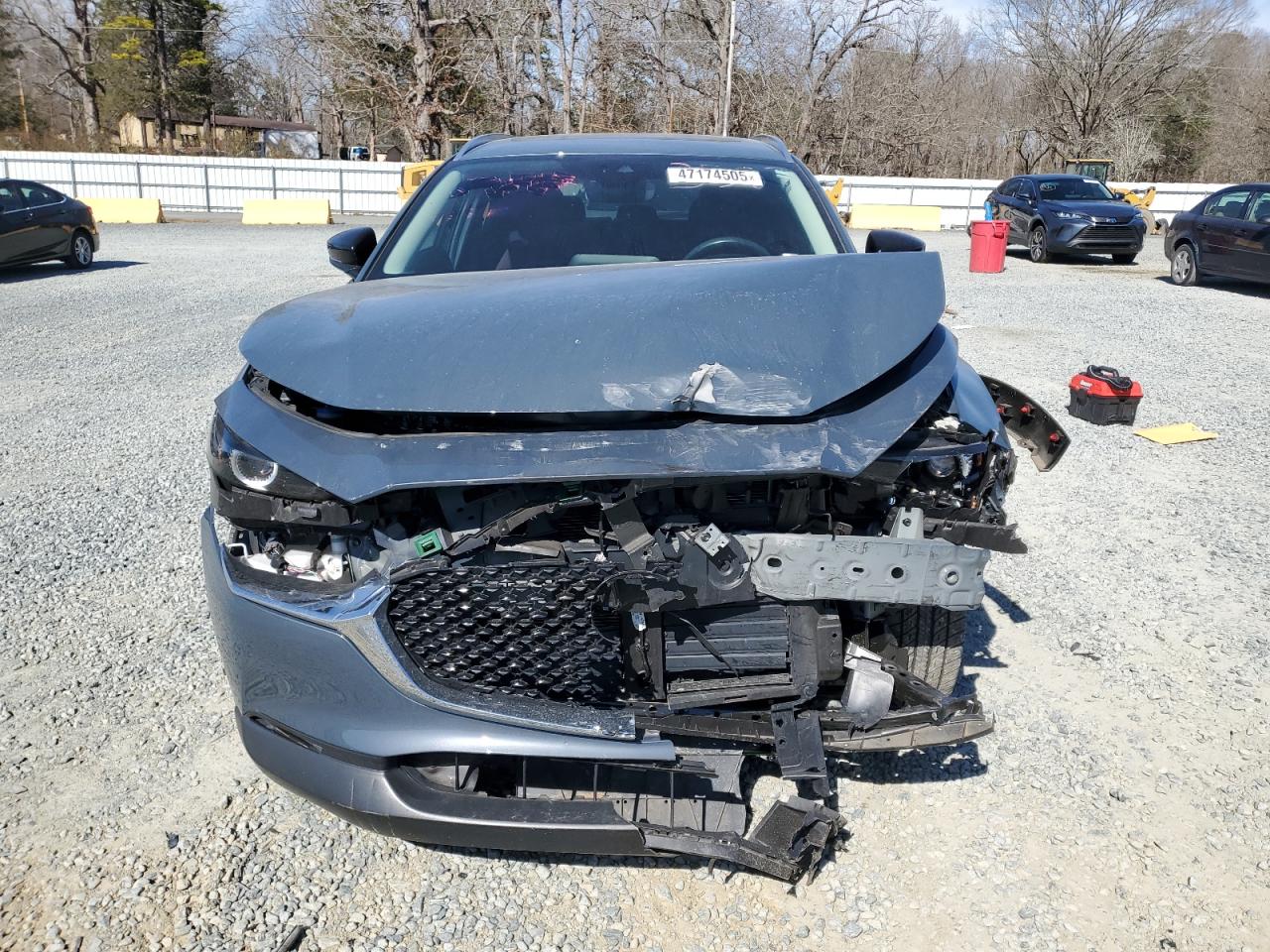 2023 Mazda CX-30 VIN 3MVDMBCM8PM573587 Copart auction photo, front end / side damage thumbnail 5