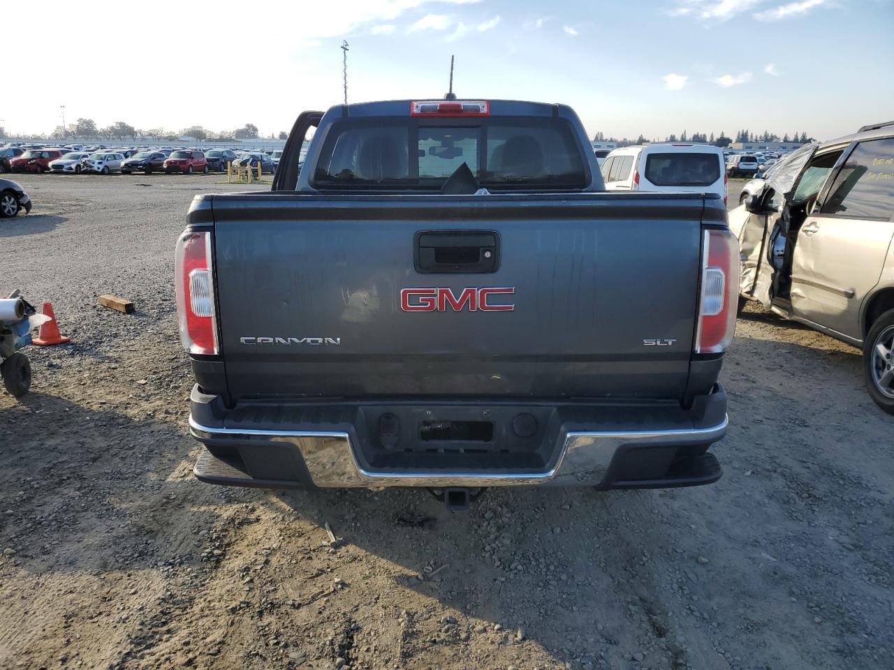 2016 GMC Canyon VIN 1GTG6DE32G1356607 Copart auction photo, front end / side damage thumbnail 6