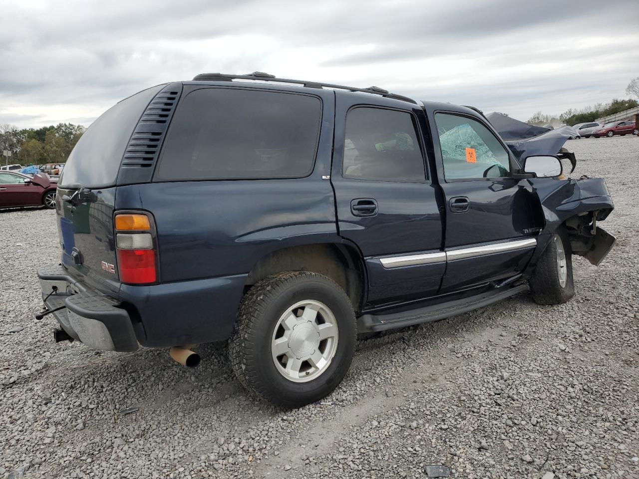 2005 GMC Yukon VIN 1GKEC13V75J144998 Copart auction photo, front end / side damage thumbnail 3