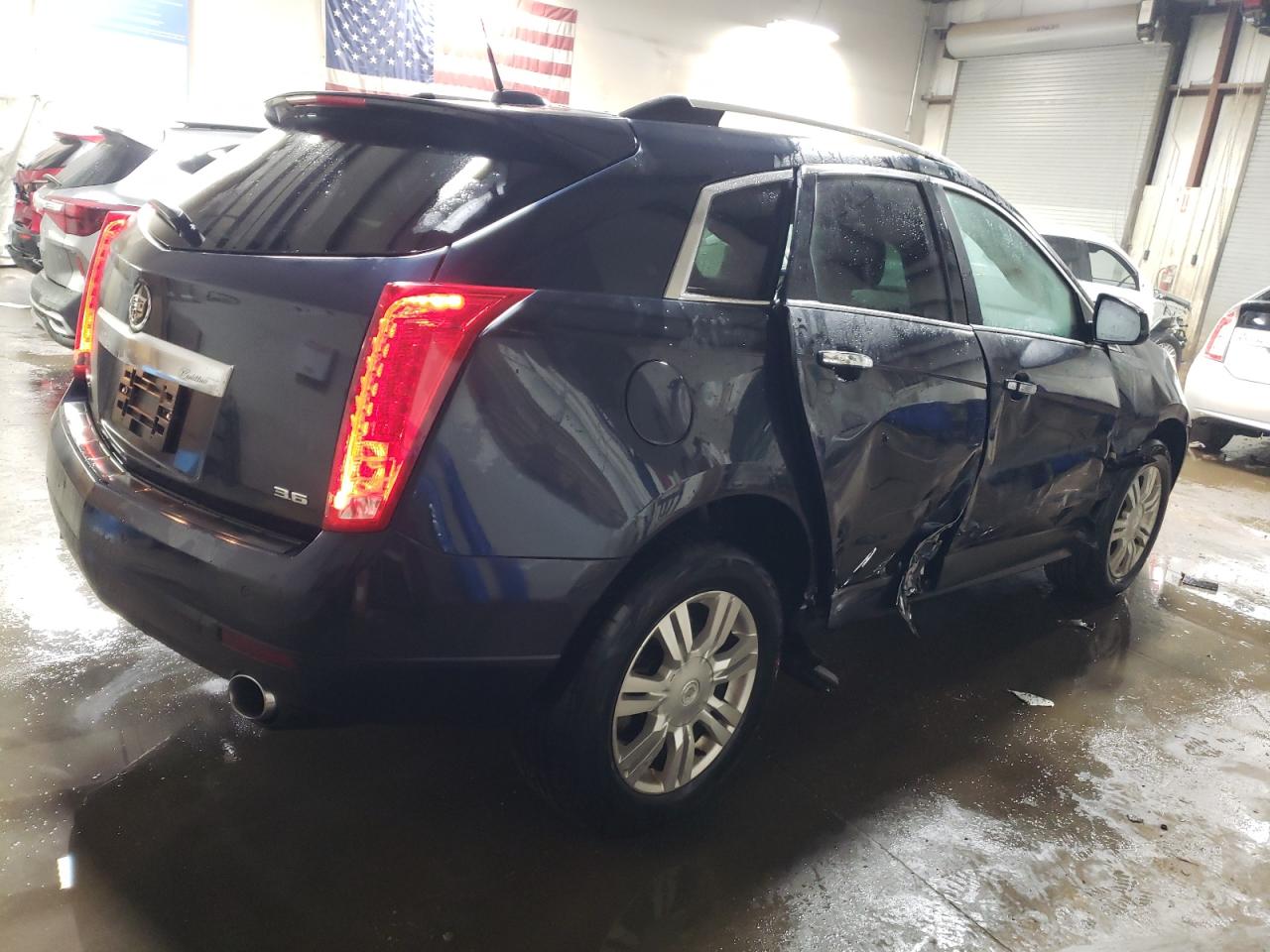 2015 Cadillac SRX VIN 3GYFNEE38FS604113 Copart auction photo, side / rear end damage thumbnail 3