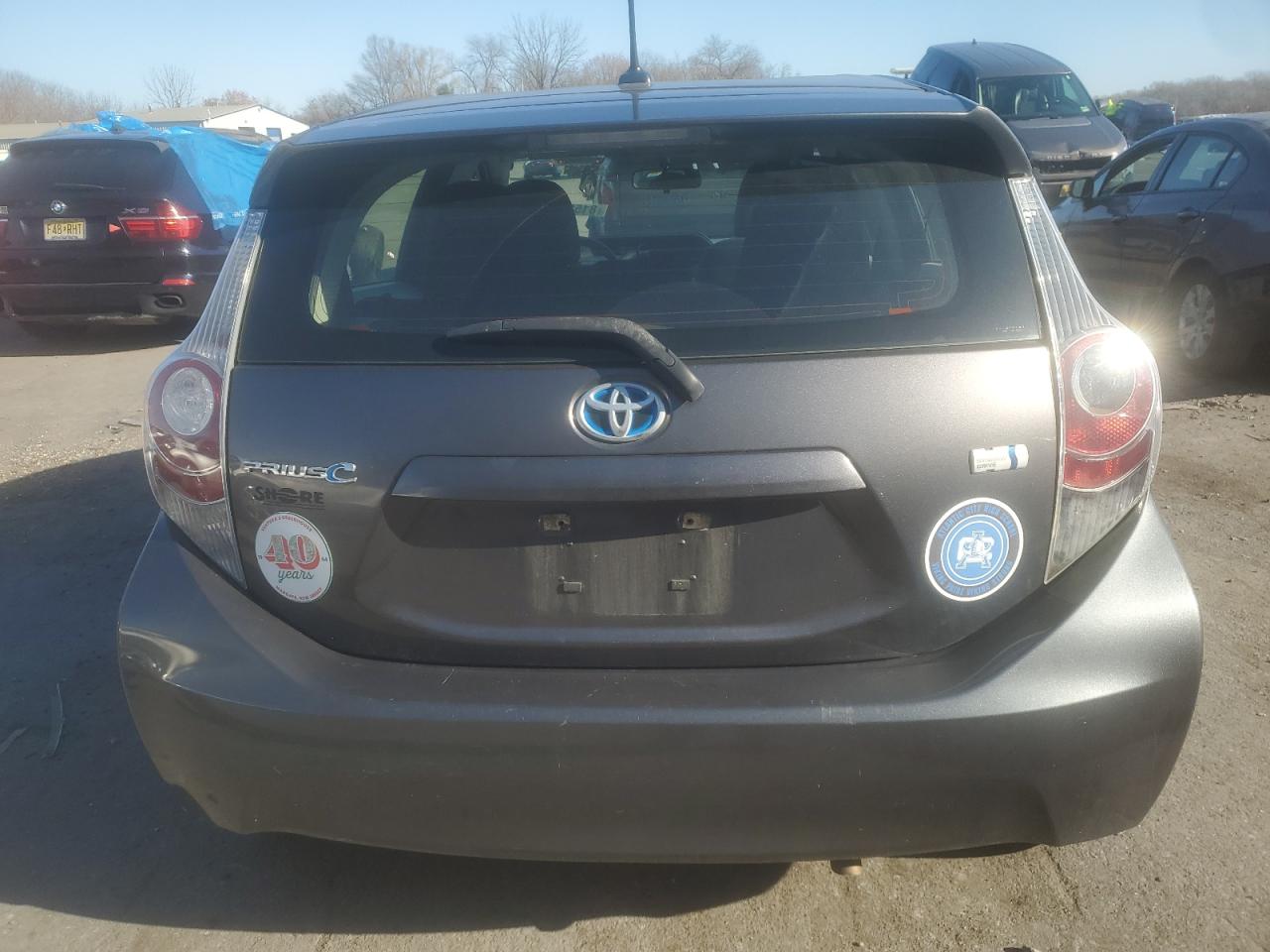 2014 Toyota Prius VIN JTDKDTB39E1063797 Copart auction photo, side / rear end damage thumbnail 6