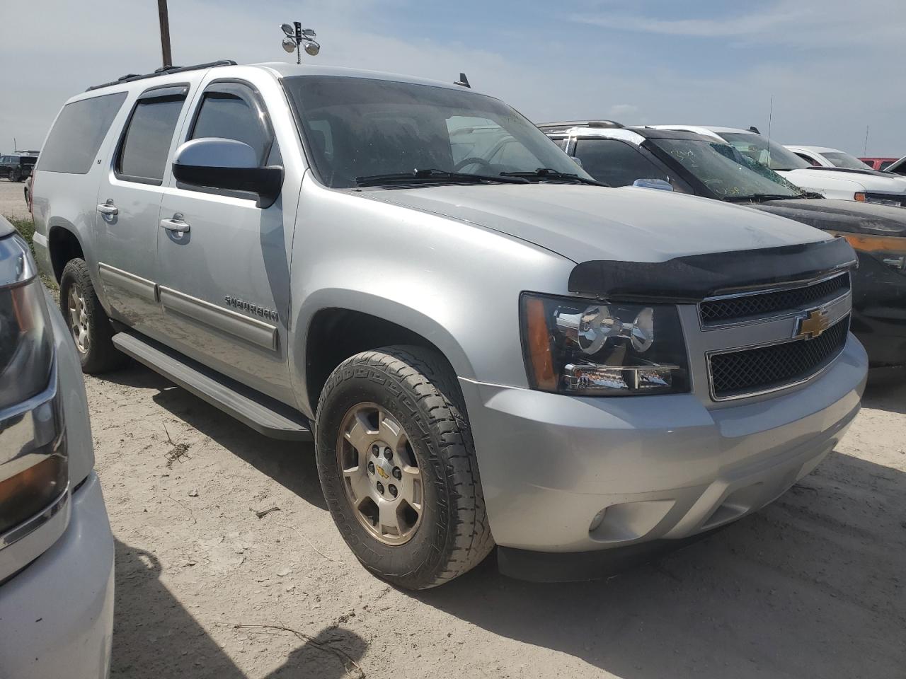 2013 Chevrolet Suburban VIN 1GNSKJE71DR110207 Copart auction photo, water/flood damage thumbnail 4