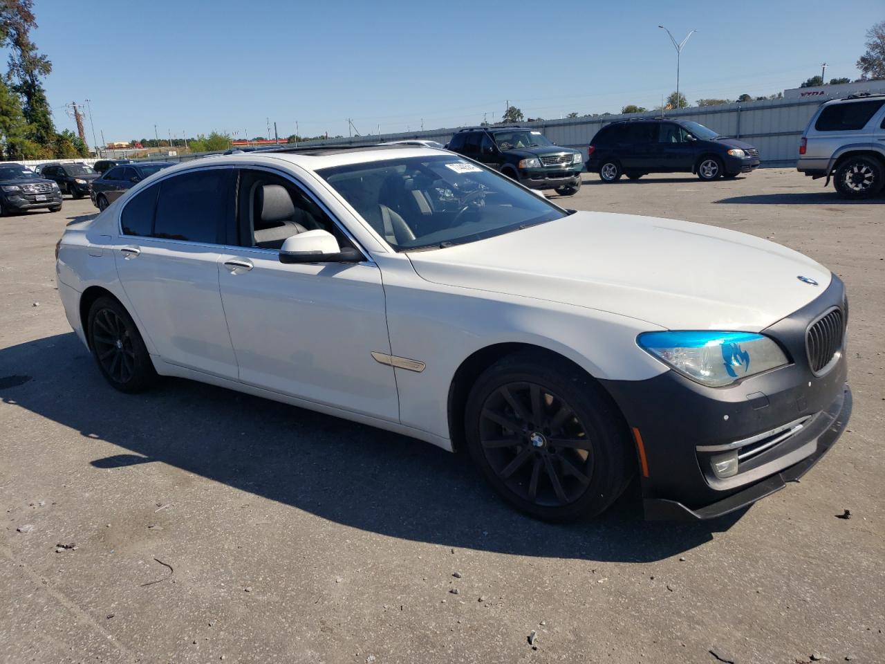 2014 BMW 7er VIN WBAYA6C56ED144241 Copart auction photo, front end / side damage thumbnail 4