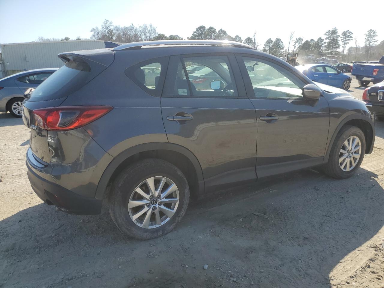 2016 Mazda CX-5 VIN JM3KE2BY2G0670711 Copart auction photo, front end damage thumbnail 3