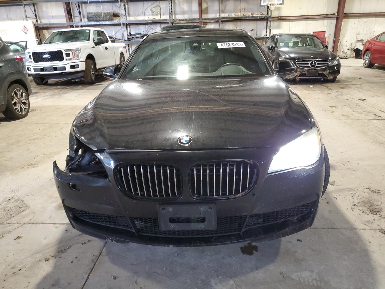 2013 BMW 7er VIN WBAYF8C51DD140867 Copart auction photo, front end / minor dent/scratches damage thumbnail 5