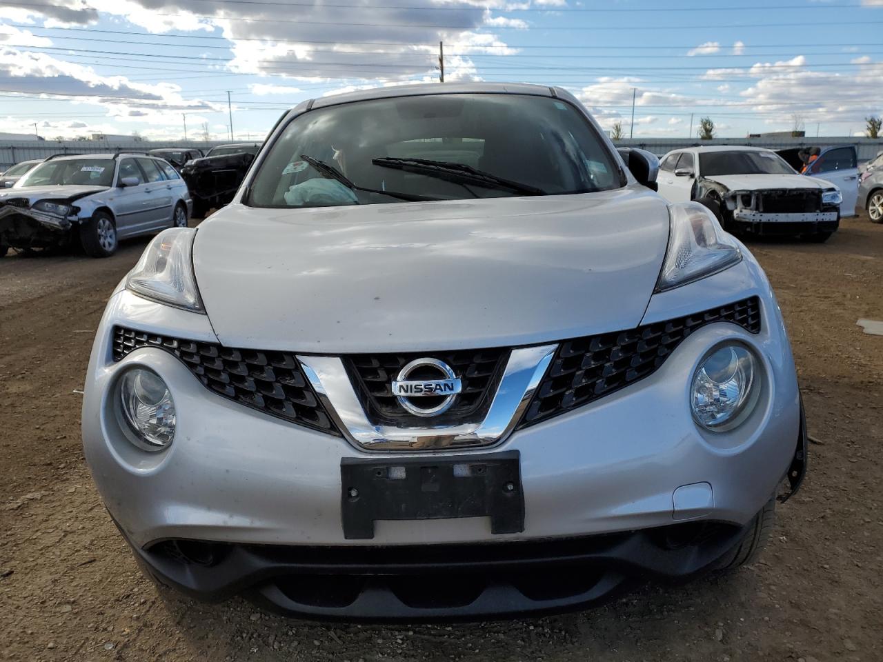 2016 Nissan Juke VIN JN8AF5MVXGT653907 Copart auction photo, side / rear end damage thumbnail 5