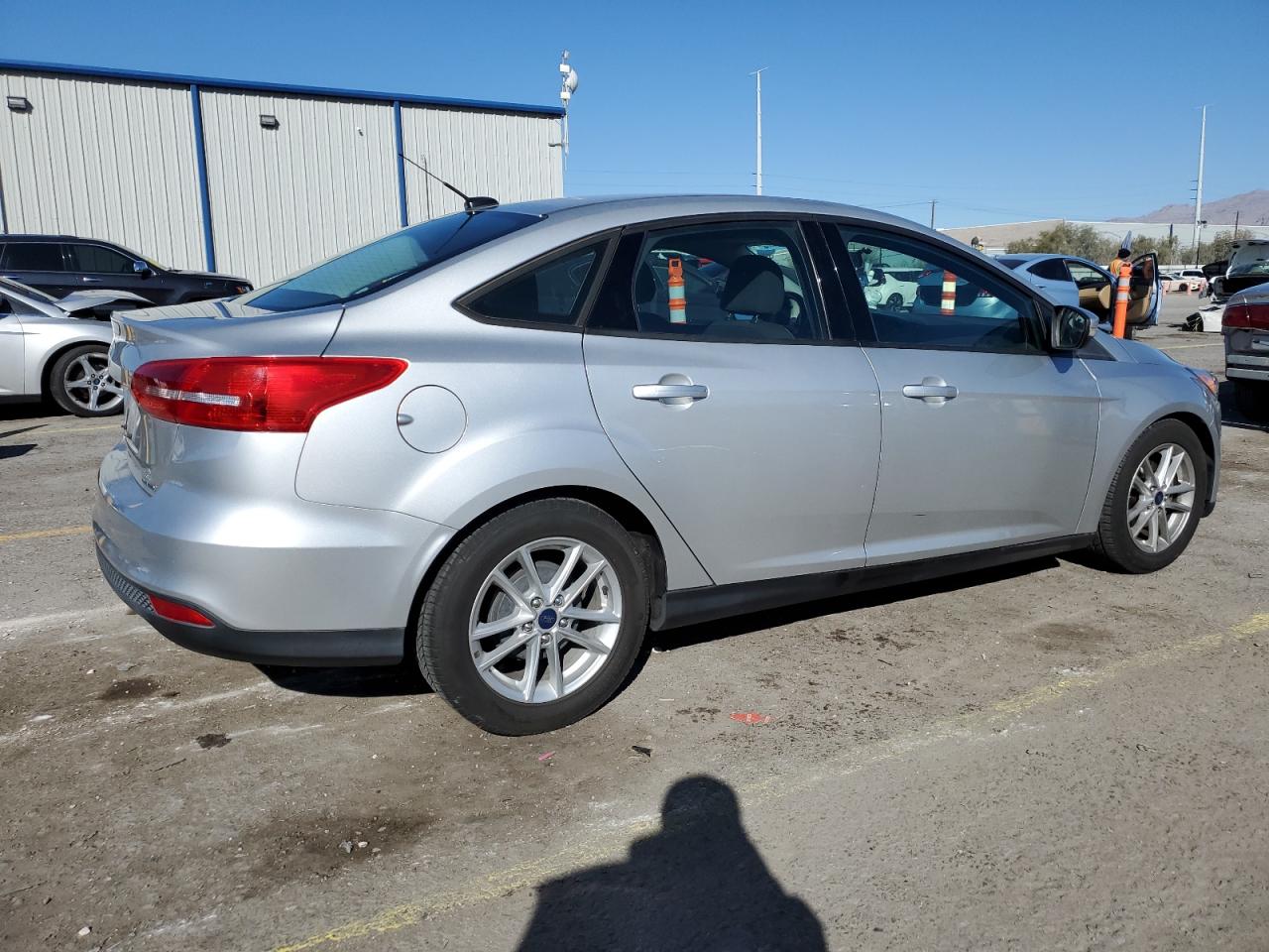 2016 Ford Focus VIN 1FADP3F22GL272362 Copart auction photo, side damage thumbnail 3