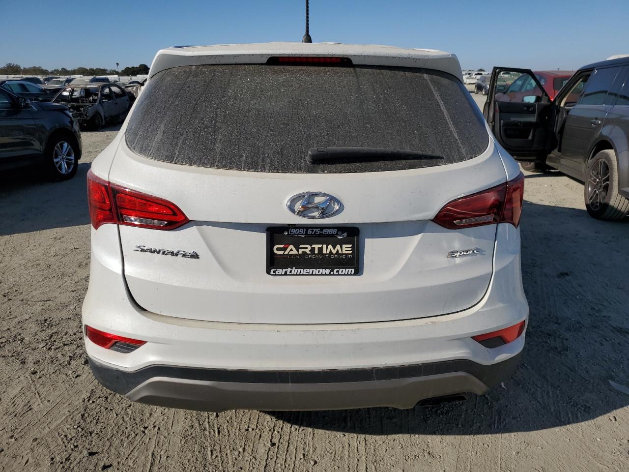 2018 Hyundai Santa Fe VIN 5NMZT3LB2JH069898 Copart auction photo, front end / side damage thumbnail 6