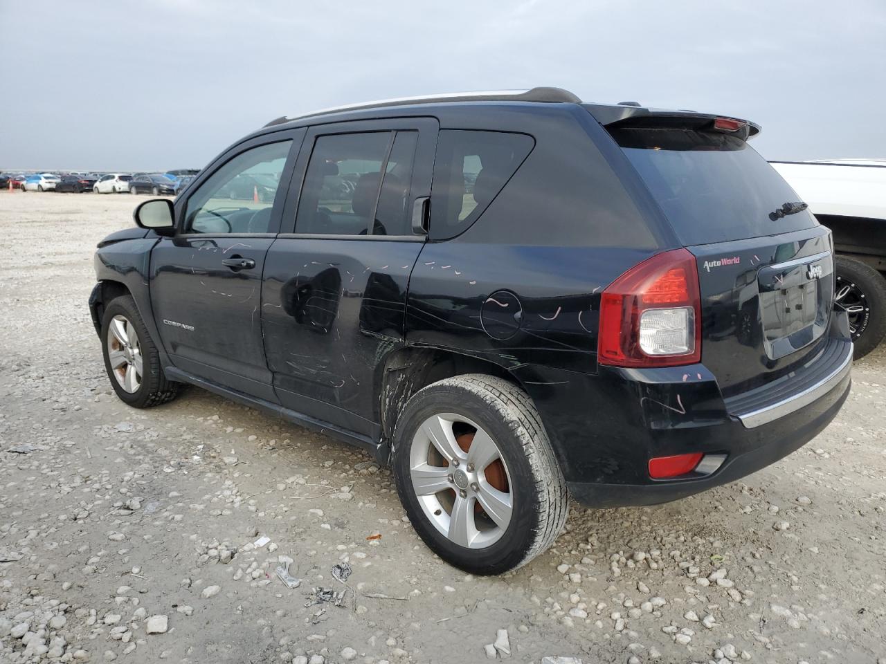 2015 Jeep Compass VIN 1C4NJCEA9FD264051 Copart auction photo, front end / minor dent/scratches damage thumbnail 2