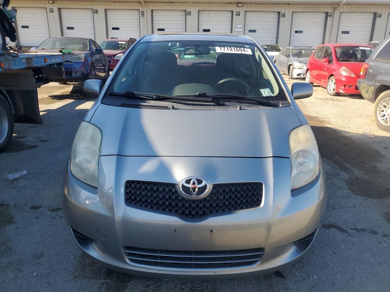 2007 Toyota Yaris VIN JTDJT903975128115 Copart auction photo, side / rear end damage thumbnail 5
