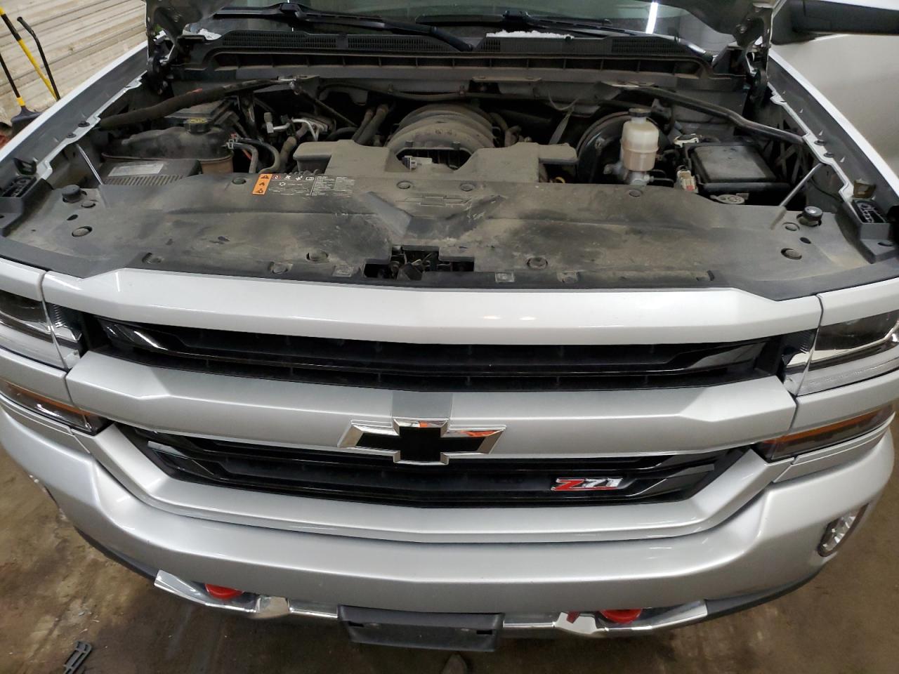2018 Chevrolet Silverado VIN 3GCUKRECXJG633718 Copart auction photo, side damage thumbnail 12