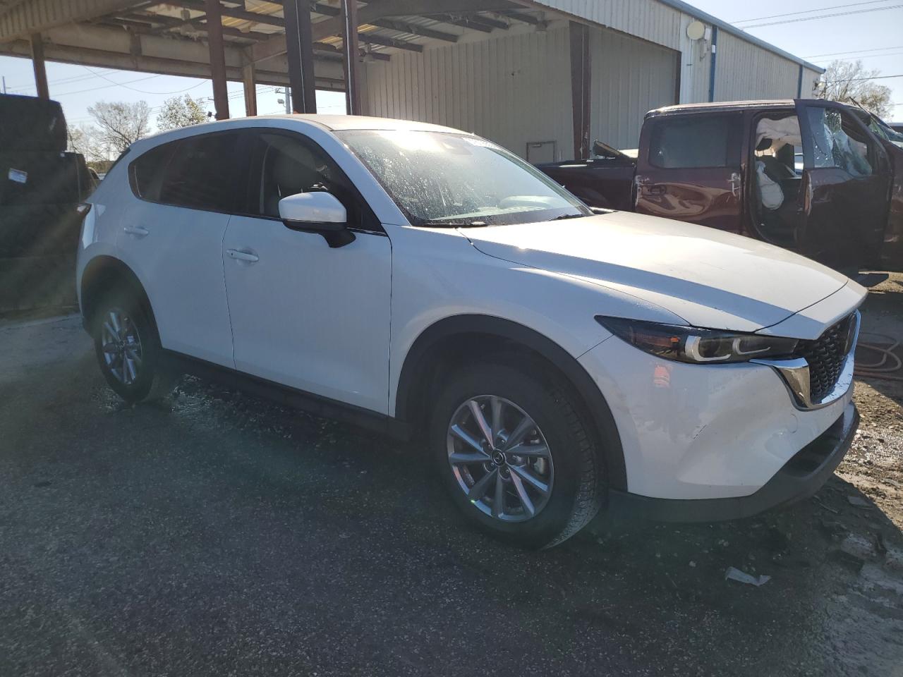 2023 Mazda CX-5 VIN JM3KFBBM9P0252379 Copart auction photo, side damage thumbnail 4