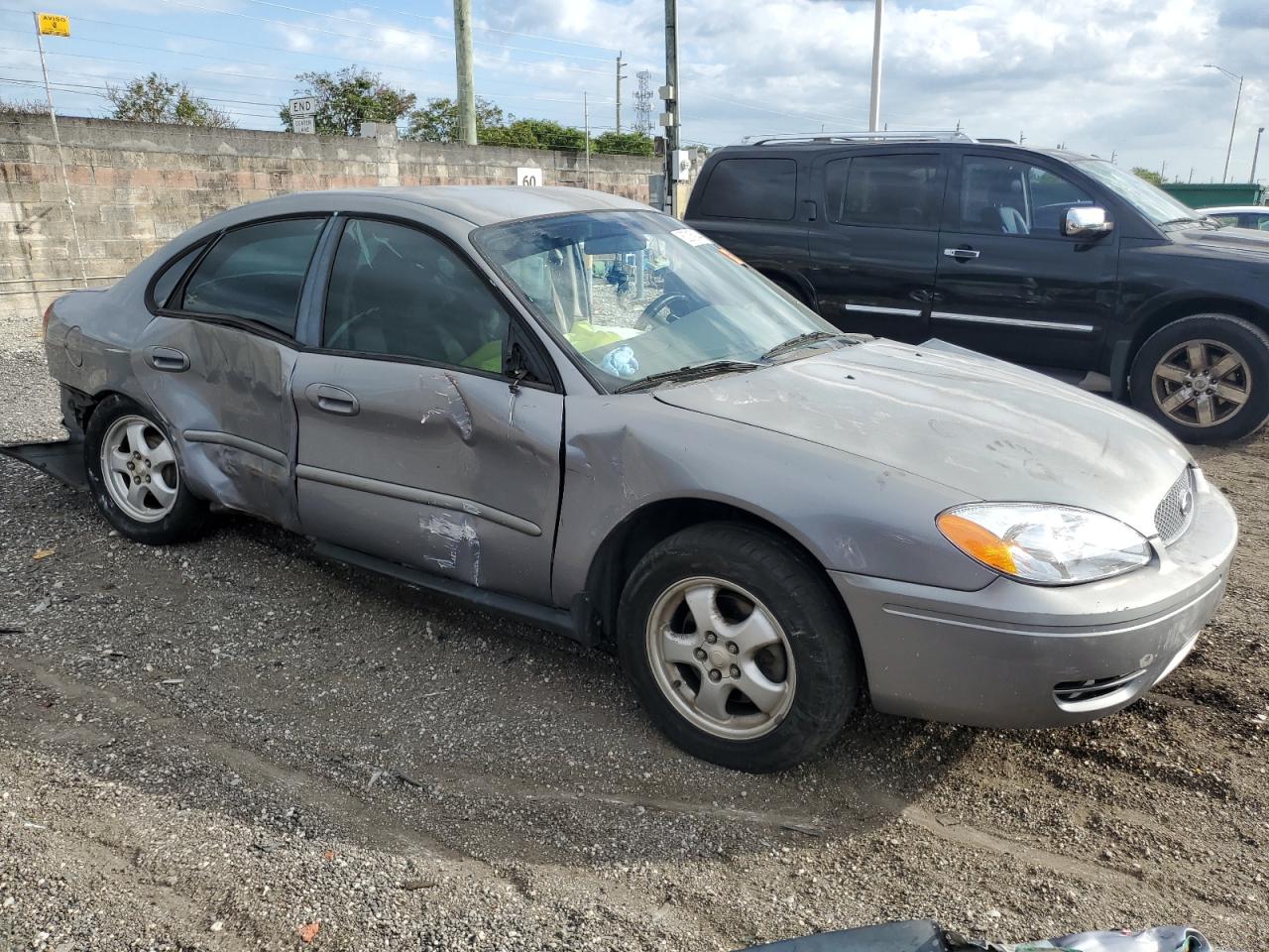 2006 Ford Taurus VIN 1FAFP53UX6A261856 Copart auction photo, all over / mechanical damage thumbnail 4
