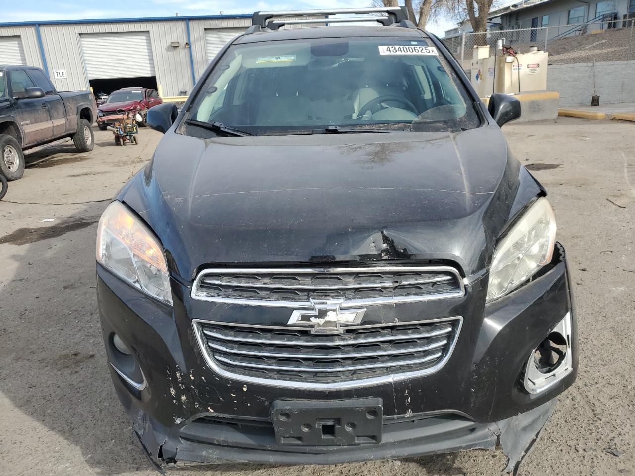 2015 Chevrolet Trax VIN 3GNCJTSB9FL243187 Copart auction photo, front end / side damage thumbnail 5