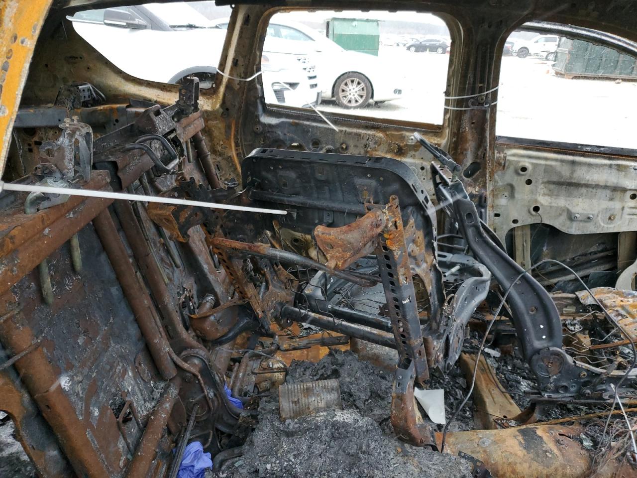2016 Ford Escape VIN 1FMCU0F74GUB11381 Copart auction photo, burn damage thumbnail 10