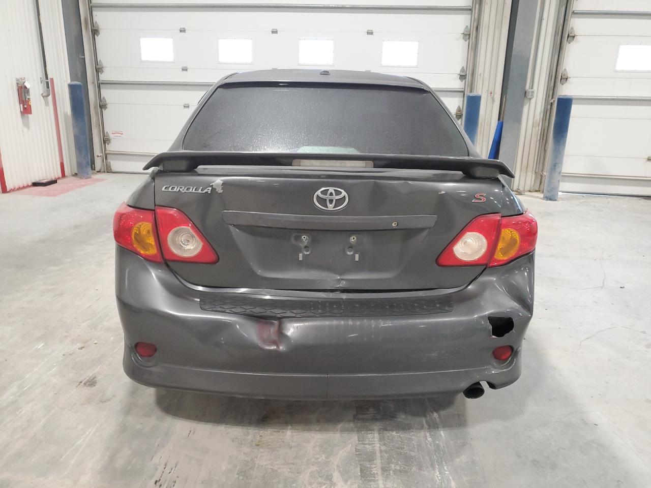 2009 Toyota Corolla VIN 1NXBU40E29Z012992 Copart auction photo, rear end damage thumbnail 6