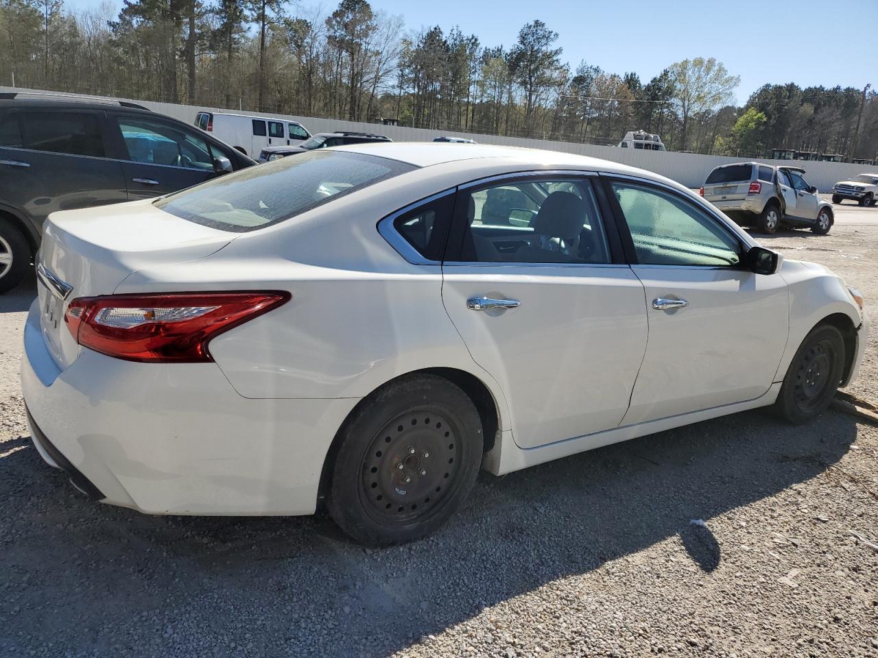 2016 Nissan Altima VIN 1N4AL3AP2GN312588 Copart auction photo, rear end / minor dent/scratches damage thumbnail 3