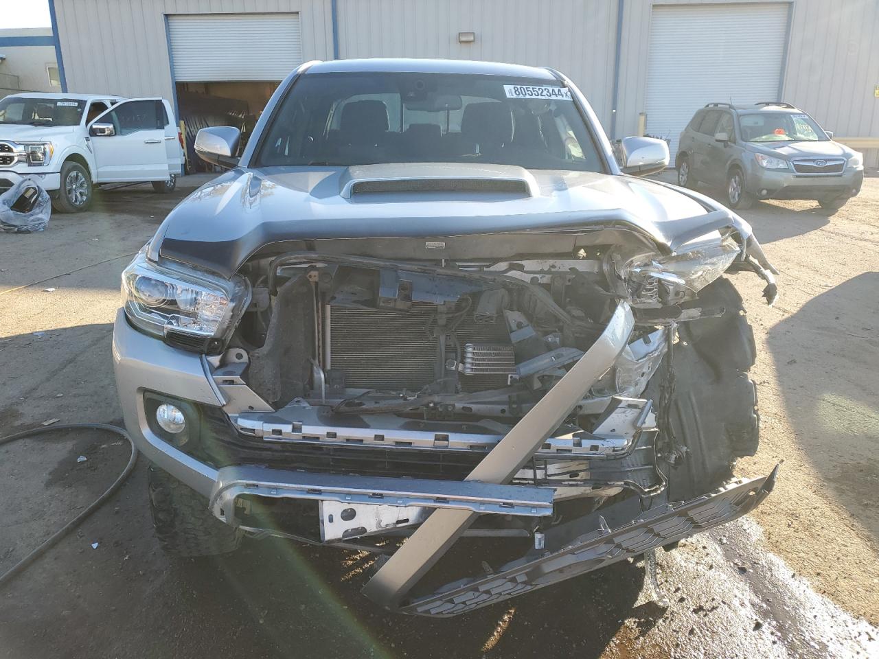 2020 Toyota Tacoma VIN 3TMCZ5AN6LM336439 Copart auction photo, front end / side damage thumbnail 5