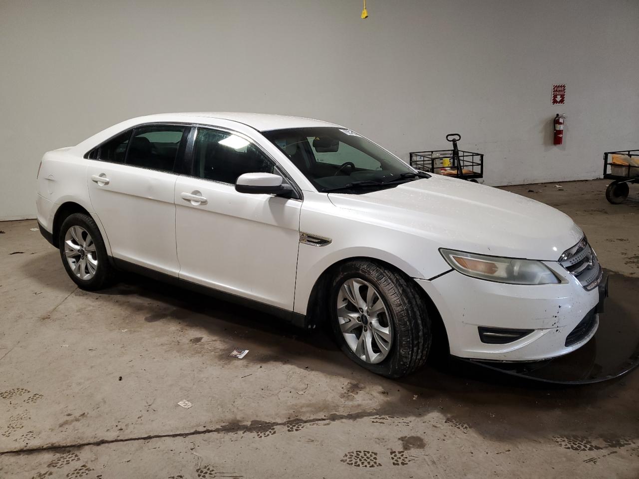 2011 Ford Taurus VIN 1FAHP2HW1BG135491 Copart auction photo, front end / side damage thumbnail 4