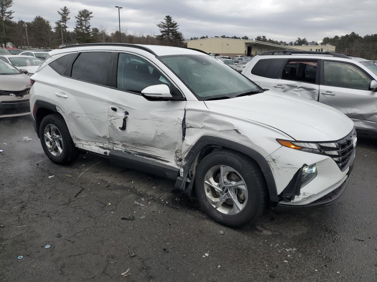 2022 Hyundai Tucson VIN 5NMJBCAE8NH086319 Copart auction photo, side / front end damage thumbnail 4