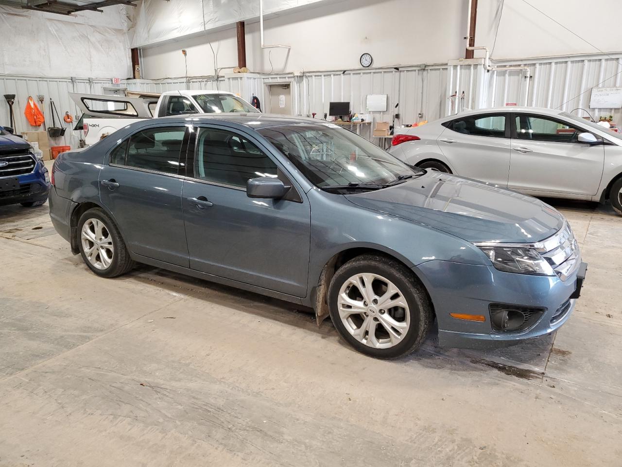 2012 Ford Fusion VIN 3FAHP0HA6CR430217 Copart auction photo, rear end damage thumbnail 4