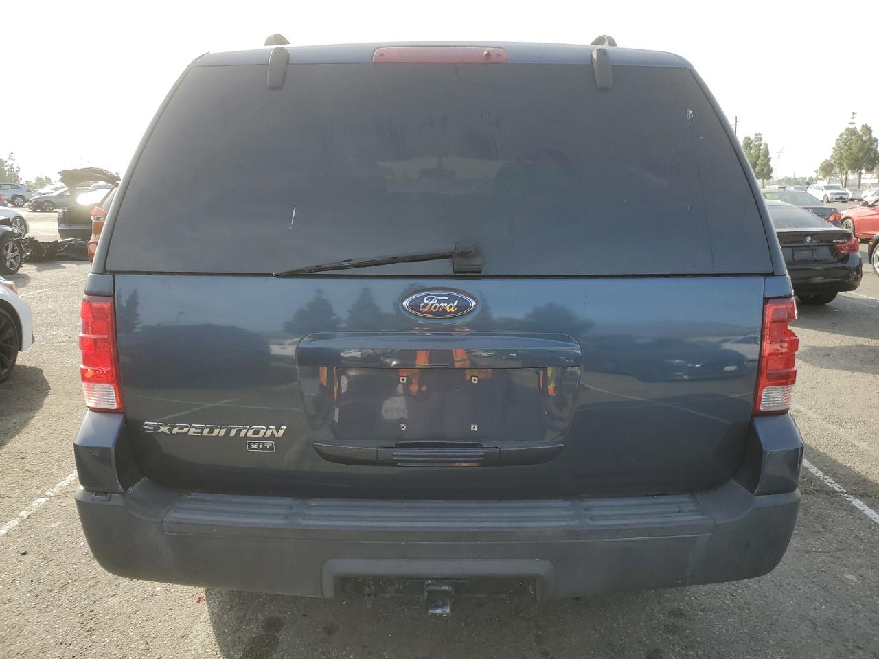 2006 Ford Expedition VIN 1FMPU15526LA24297 Copart auction photo, side damage thumbnail 6