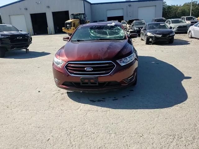2016 Ford Taurus VIN 1FAHP2E82GG103873 Copart auction photo, top/roof damage thumbnail 13