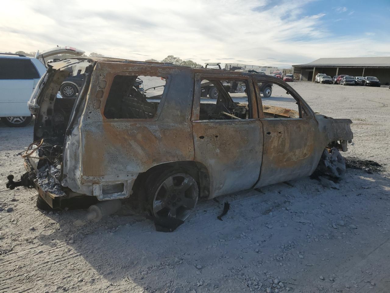 2015 Chevrolet Tahoe VIN 1GNSKBKC2FR558210 Copart auction photo, burn / all over damage thumbnail 3