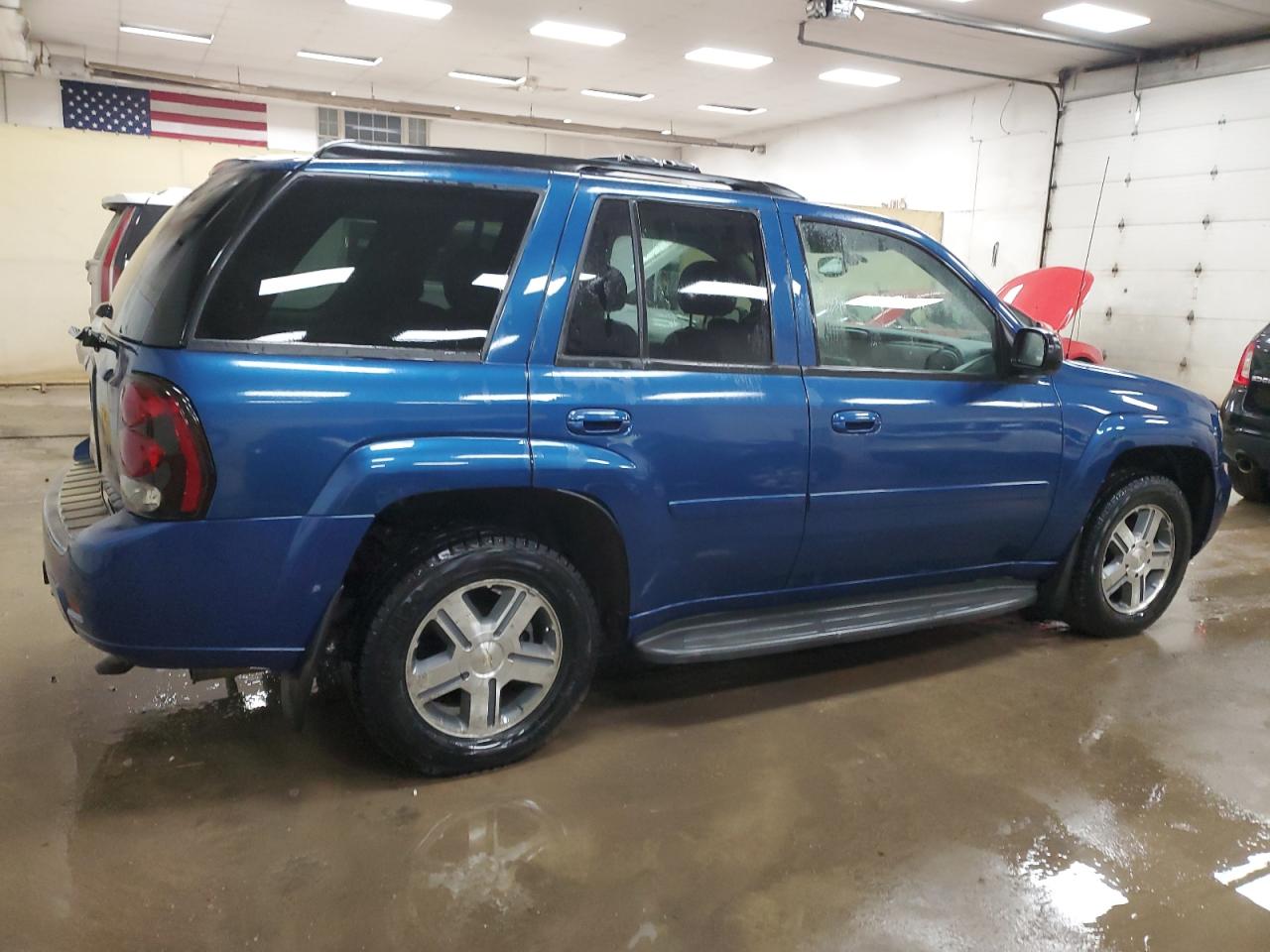 2006 Chevrolet TrailBlazer VIN 1GNDT13SX62140878 Copart auction photo, side / front end damage thumbnail 3