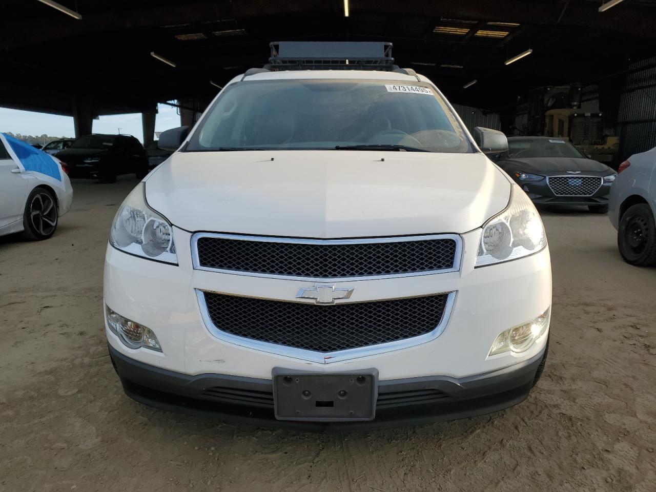 2012 Chevrolet Traverse VIN 1GNKRFED8CJ387450 Copart auction photo, side / rear end damage thumbnail 5