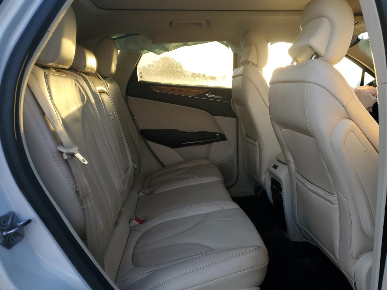 2015 Lincoln MKZ VIN 5LMCJ1A96FUJ15869 Copart auction photo, all over damage thumbnail 10