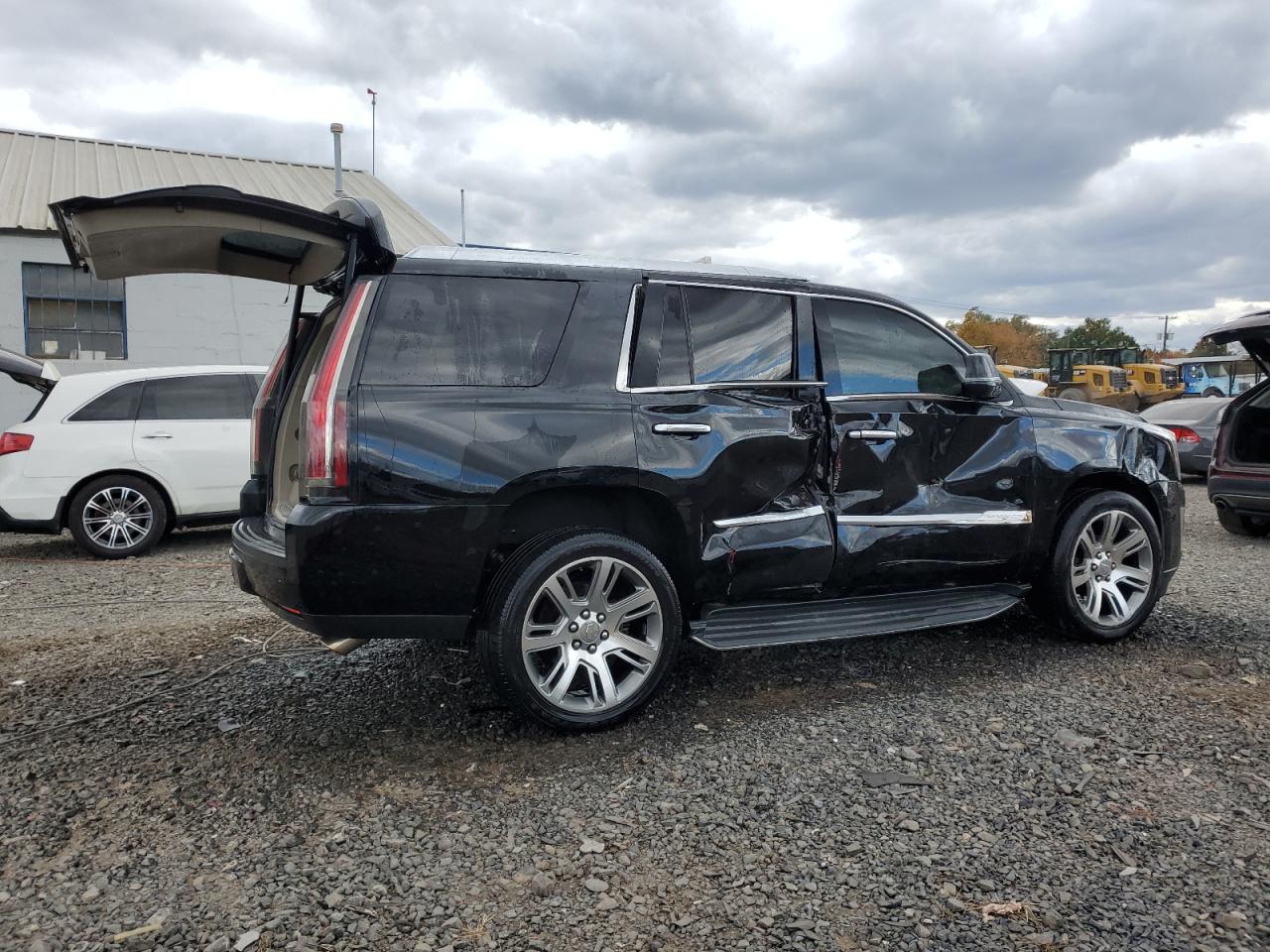 2016 Cadillac Escalade VIN 1GYS4BKJ2GR211179 Copart auction photo, side / front end damage thumbnail 3