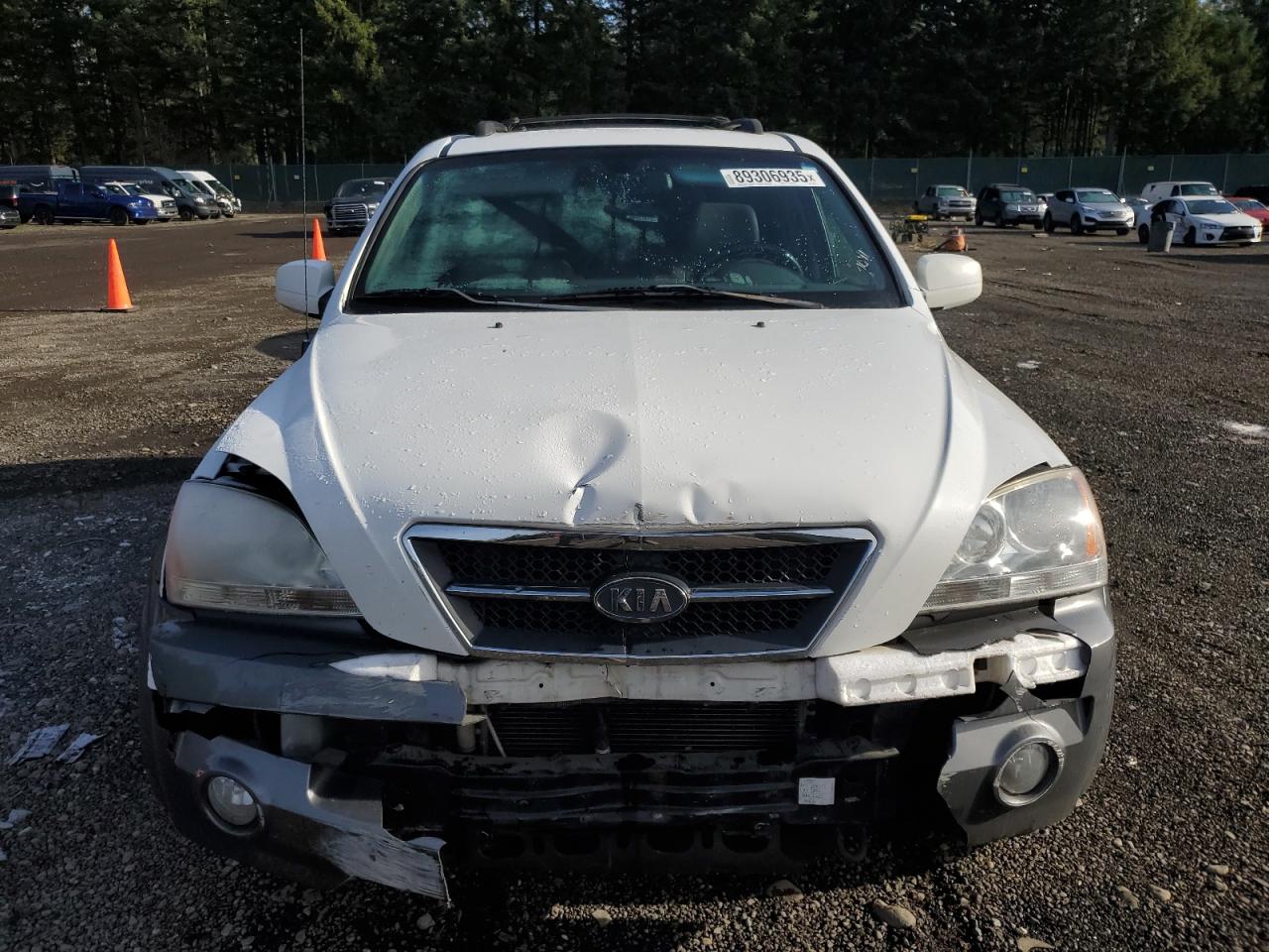 2005 KIA Sorento VIN KNDJC733955347041 Copart auction photo, front end damage thumbnail 5
