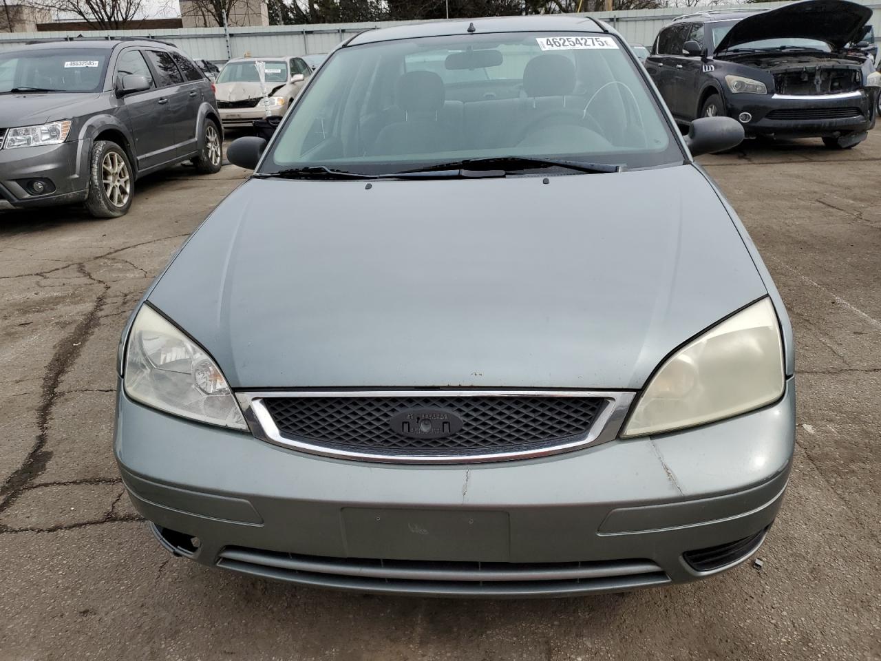 2006 Ford Focus VIN 1FAFP34N46W179989 Copart auction photo, rear end / front end damage thumbnail 5